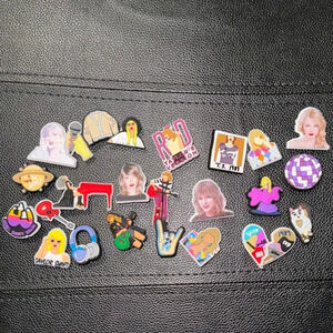 25 SET OF TAYLOR SWIFTIE ERAS CROC JOBBITZ THEMSED SHOE CHARMS SHOWGIRL POETS
